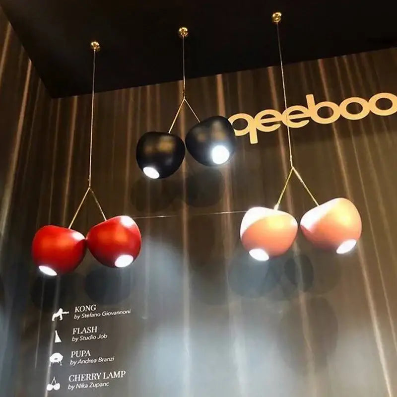 Modern italian gold cherry pendant light with glossy red black peach shades and gold-toned hanging wires for dining room decorbites gold pendant