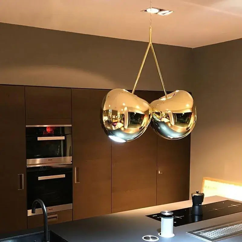 Modern italian gold pendant light with mirrored cherry-shaped design ideal for dining room decorbites gold pendant
