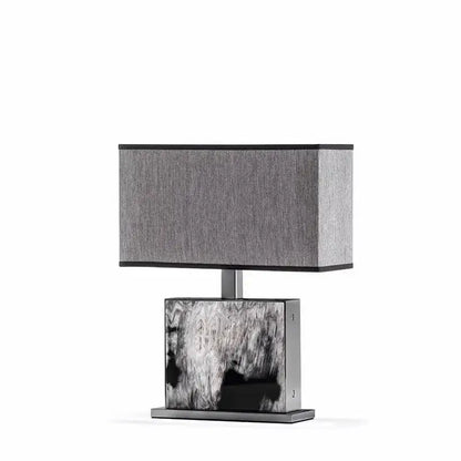 Modern italian luxury table lamp with textured gray fabric shade and metallic black-and-white marbled base for decorbites