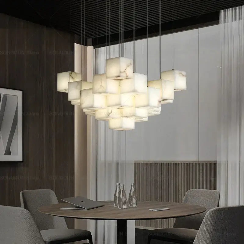 A modern decorbites jade design spiral alabaster chandelier with translucent white onyx cubes for living room lighting