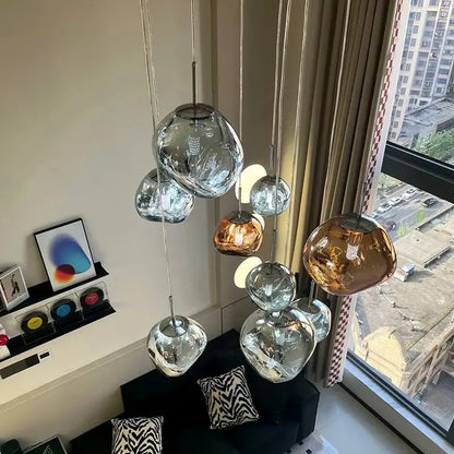 Modern cluster lava glass pendant light with polished chrome finish and reflective silver and copper globes for dining room