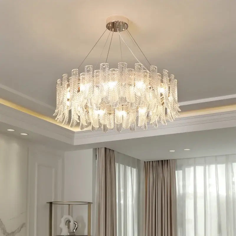 A modern crystal led ceiling lamp with clear glass feather elements and polished chrome mount for living room decorbites crystal led