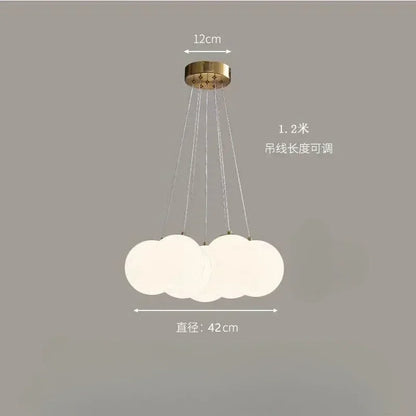A modern cloud-shaped luxury led pendant lamp with frosted milk white glass orbs for living room lighting decor
