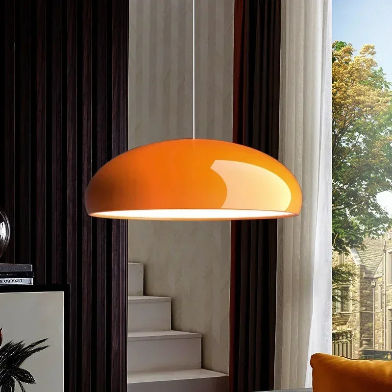 Vibrant orange round aluminum pendant light with glossy finish for modern LED dining table and room decor lighting