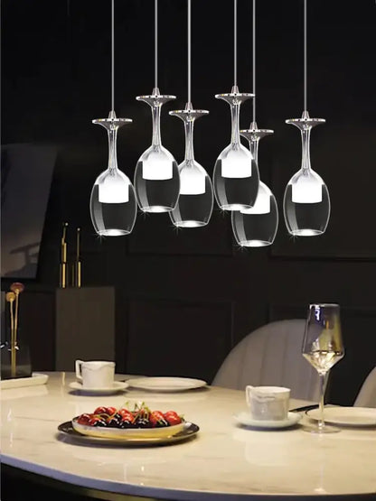 Modern led wine glass pendant lights featuring five clear glass wine glasses with bright white decorbites led wine bulbs