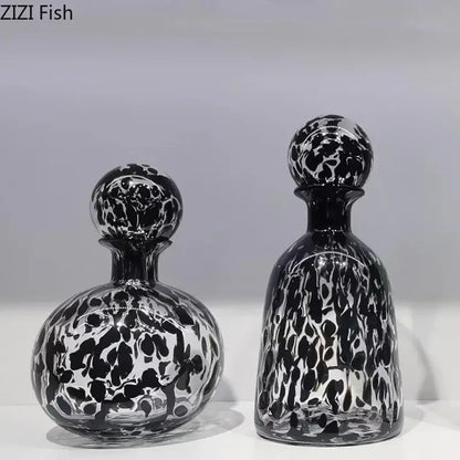 Two black and clear glass decanters with modern leopard texture for black and white dining room decorbites leopard texture