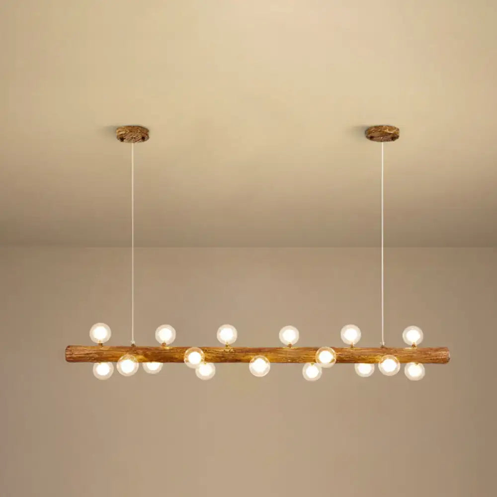 Rustic wooden log pendant light with multiple spherical bulbs in brown metal modern linear island pendant lamp
