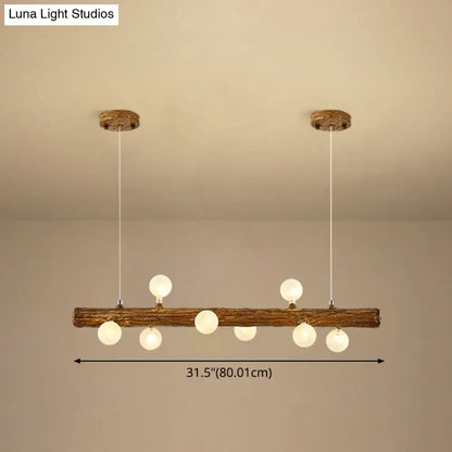 Rustic wooden log pendant light with six frosted glass globes in brown metal modern linear island pendant lamp