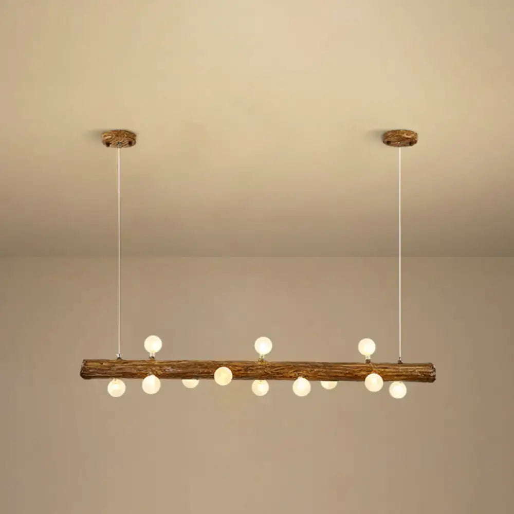 Rustic brown modern linear island pendant light featuring wooden log design with evenly spaced spherical bulbs metal lamp