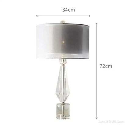 Modern luxe gray and crystal table lamp with a faceted crystal base and silver gradient shade for bedroom lighting decorbites crystal table lamp