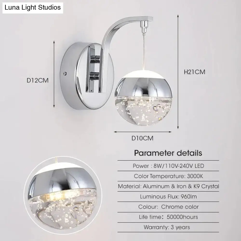 Modern luxurious crystal led wall sconce with chrome finish and floating crystal bubbles for bedroom lighting