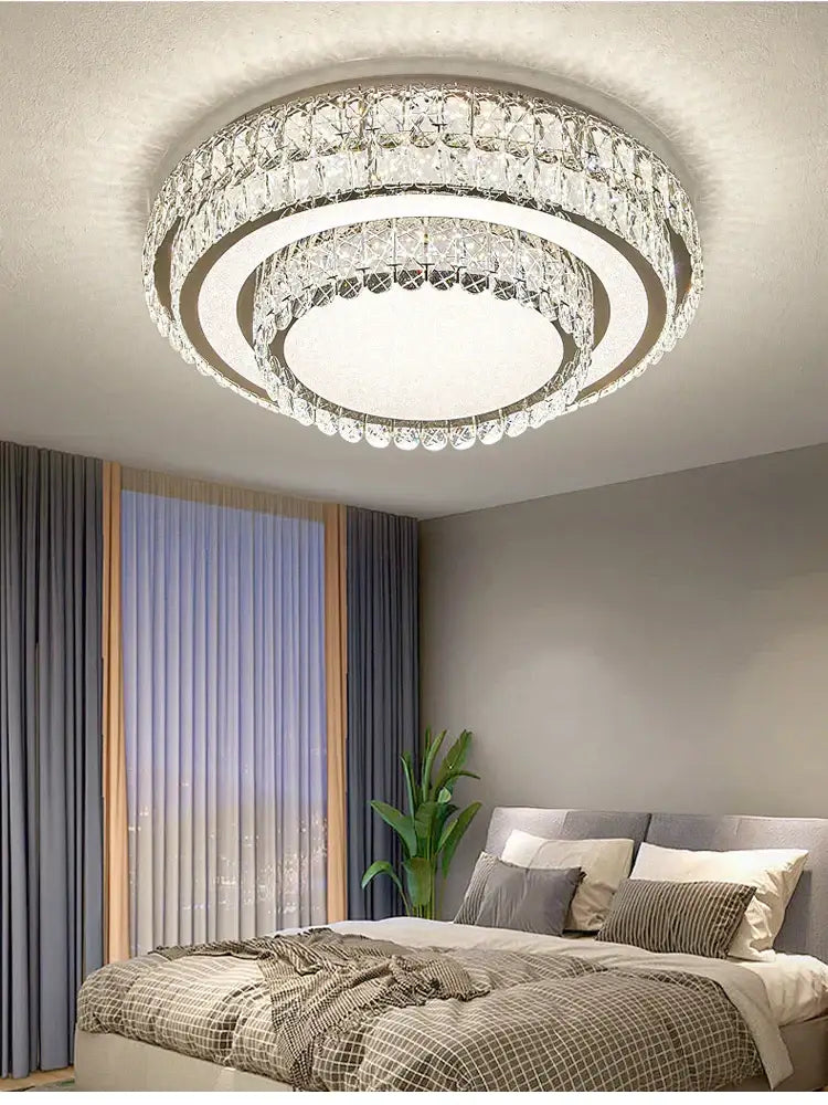 Modern luxury crystal led ceiling lamp with concentric clear faceted crystals and central illuminated panel decorbites crystal led