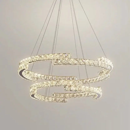 A modern luxury crystal led chandelier with multi-tiered interlocking rings suspended by thin wires for foyer decorbites crystal led