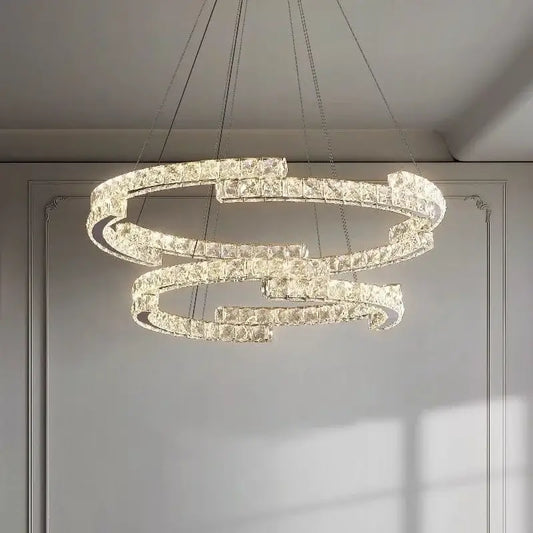 Modern luxury crystal led chandelier with interlocking clear faceted crystals in a sleek metallic frame for foyer decorbites crystal led