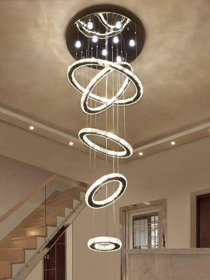 Modern luxury decorbites crystal rings chandelier with glowing spiral rings and embedded crystal accents for staircase lighting