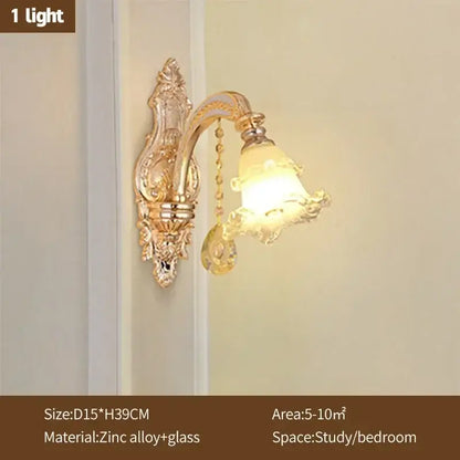 Modern luxury gold-toned ornate wall sconce with glass bell shade and decorative chain for crystal ceiling chandelier decorbites