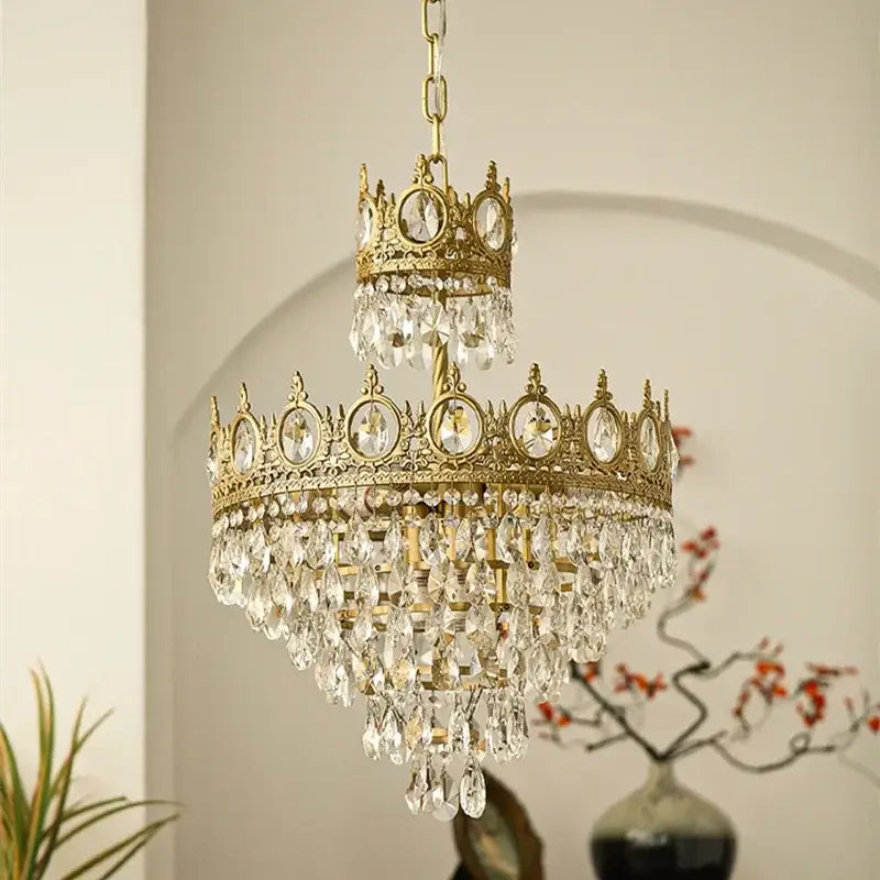 Modern luxury gold crystal crown chandelier with clear crystal droplets and ornate detailing for living room decorbites crystal crown