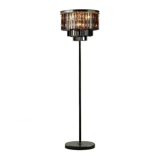 Modern luxury gray crystal black standing light featuring a sleek black floor lamp with amber crystal black prisms shade