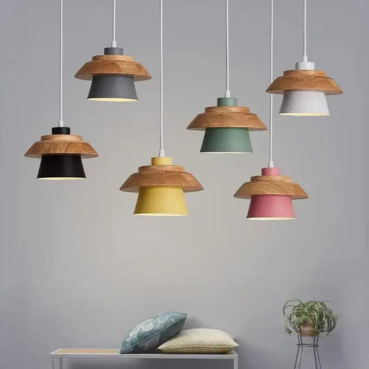 Modern macaron pendant light with layered wooden and painted metal shades in assorted colors works beautifully in dining spaces feel