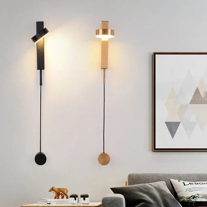 Two modern wall lamps with black rotating led and brass-toned minimalist geometric design for bedroom decorbites