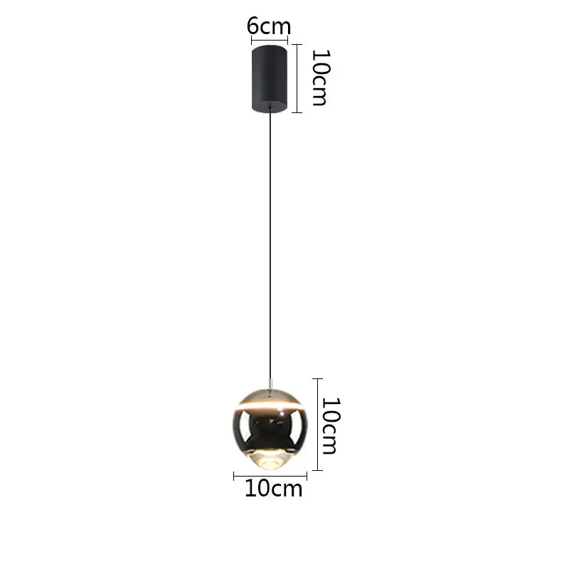 Modern matte black ball pendant light with a 10cm glass globe ideal for bedroom and kitchen island lighting