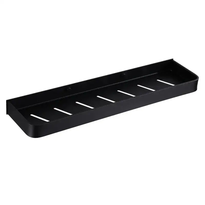 Black aluminum bathroom corner shelf with sleek modern design and evenly spaced horizontal slits by decorbites