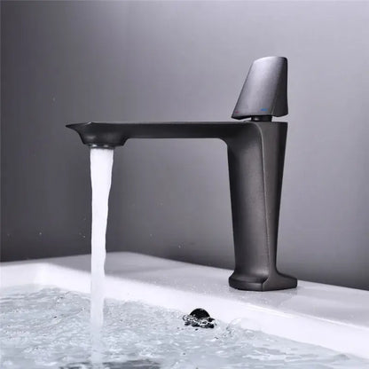 Modern matte black and white brass sink faucet with sleek angular design and tall spout for black brass bathroom decorbites