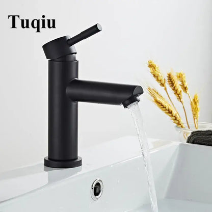 Modern matte black baking stainless basin faucet with black matte finish and sleek cylindrical design for bathroom use
