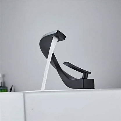 Modern matte black basin faucet with sleek curved design and single lever handle for bathroom decorbites black basin use