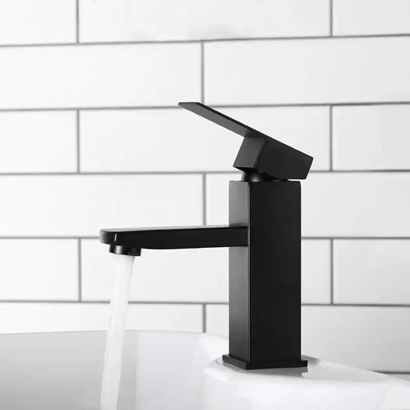 Modern matte black basin faucet with angular design and single lever handle by decorbites black basin faucet
