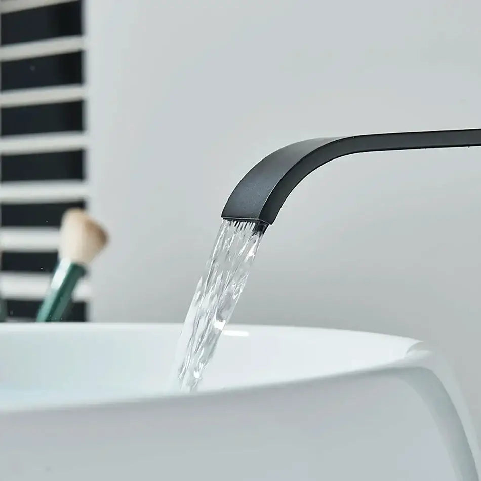 Modern matte black basin faucet mixer with sleek curved spout and black matte finish decorbites basin faucet design