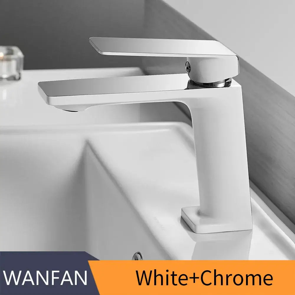 Modern matte black basin faucet mixer tap with white and chrome finish and angular minimalist design for bathroom use
