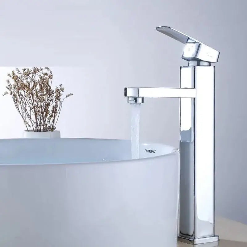 Chrome finished modern waterfall basin mixer with sleek tall rectangular spout by decorbites basin mixer