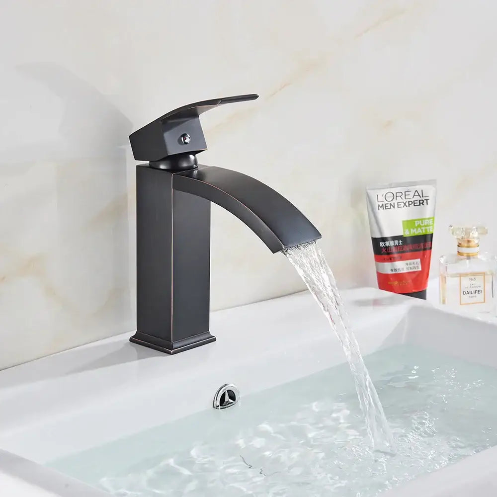 Modern matte black basin mixer faucet with sleek curved spout and rectangular base in black matte finish