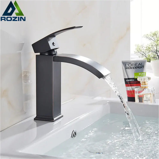 Modern matte black basin mixer faucet with sleek curved spout and single lever handle for bathroom use