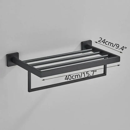 Modern matte black bathroom accessories set featuring a black matte-finished metal towel rack with four bars and lower loop decorbites black bathroom