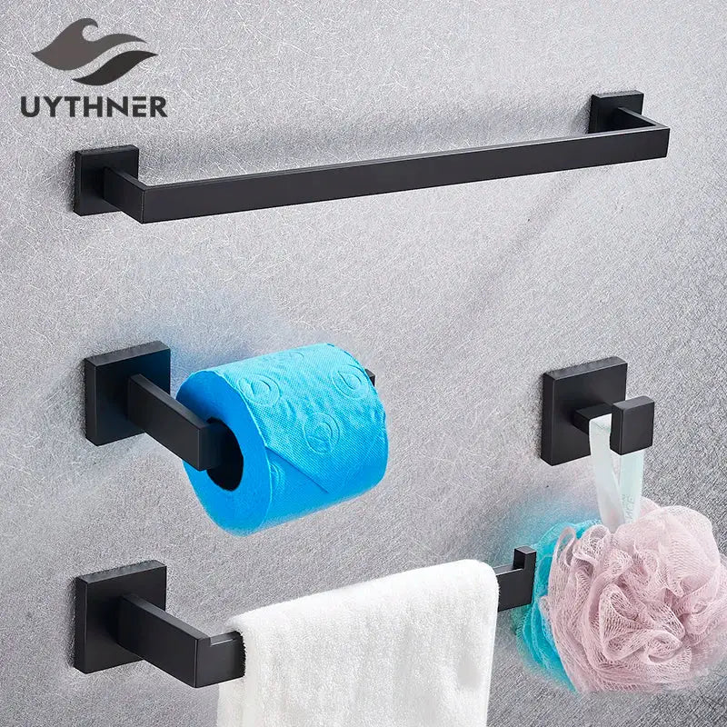 Modern matte black bathroom accessories set featuring a black matte-finished metal towel rack with square brackets decorbites black bathroom