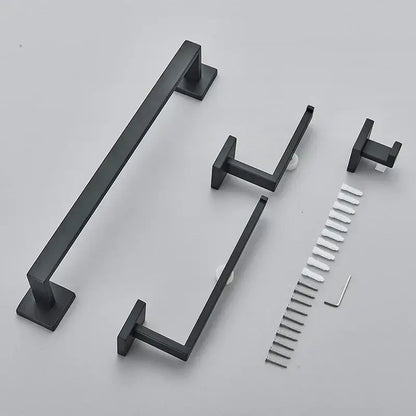 Modern matte black bathroom set featuring a black matte-finished metal towel rack with matching hooks and hardware decorbites black bathroom