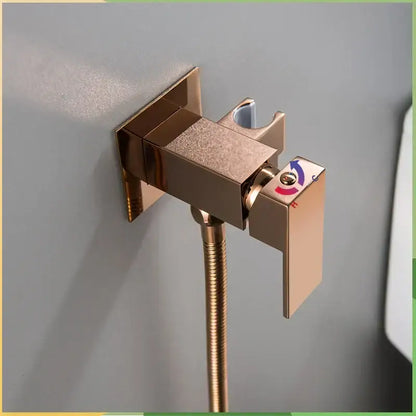 Modern matte black bidet faucet shower mixer with rose gold finish wall-mounted spray and flexible hose in sleek design