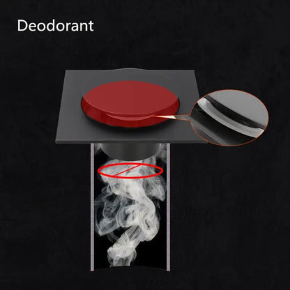 Red circular deodorant stick with a sleek metallic cap next to a modern matte black decorbites brass shower floor drain