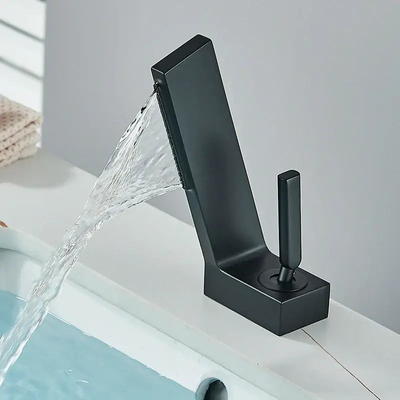 Modern matte black brass waterfall basin faucet with sleek rectangular design and a single vertical handle by decorbites brass waterfall