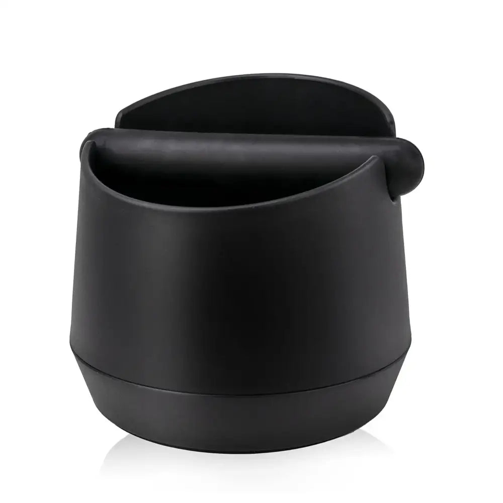 Modern matte black coffee knock box with black matte-finish coffee scoop and ergonomic handle for efficient coffee knock use