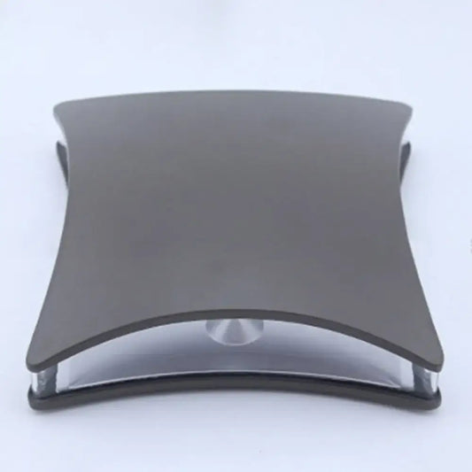 Modern matte black curved rectangular desk lamp with sleek metallic base and transparent glass accent for bedroom use