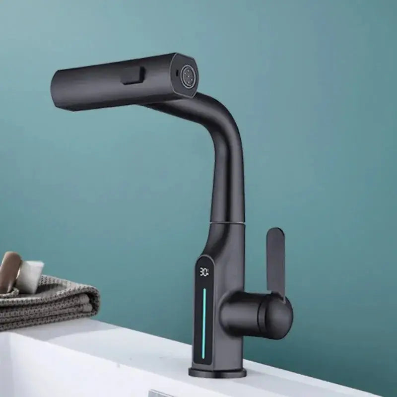 Modern matte black basin faucet with sleek curved design and decorbites digital display waterfall feature