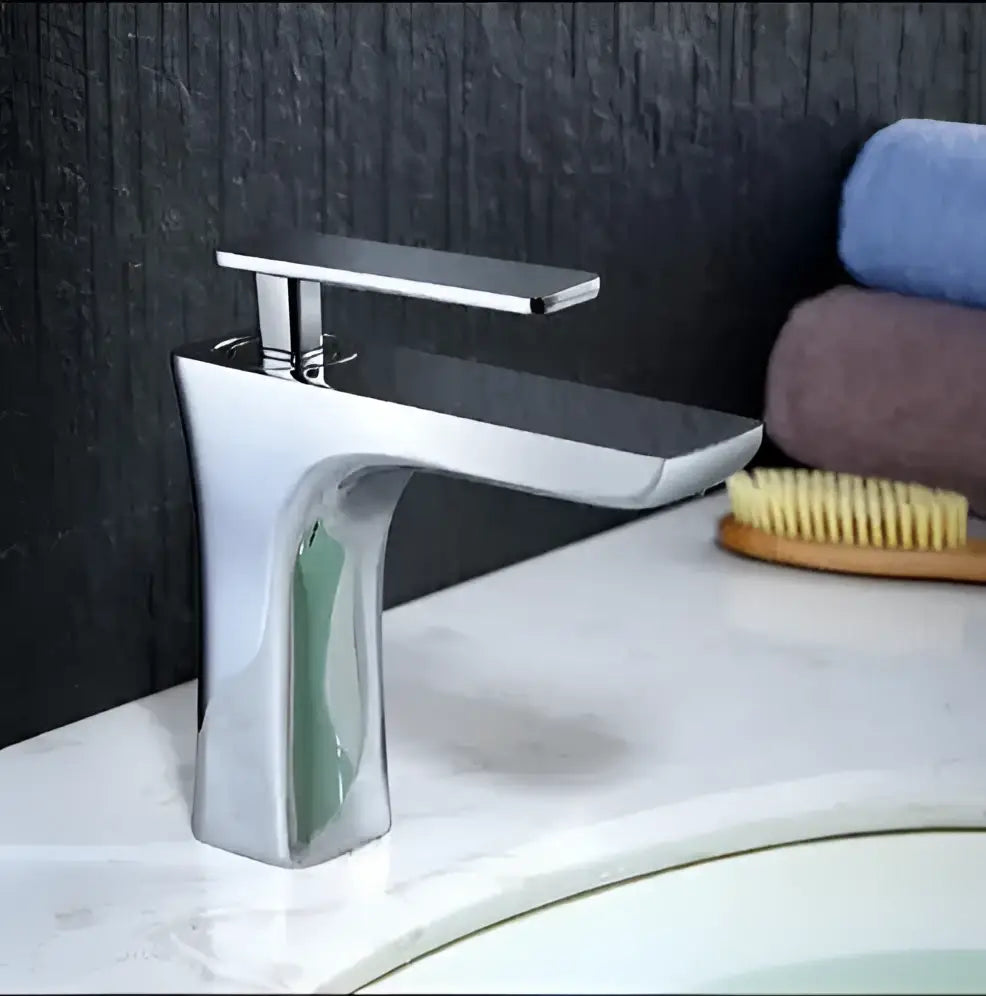 Modern chrome-finished basin faucet with sleek rectangular spout and minimalist design decorbites basin faucet