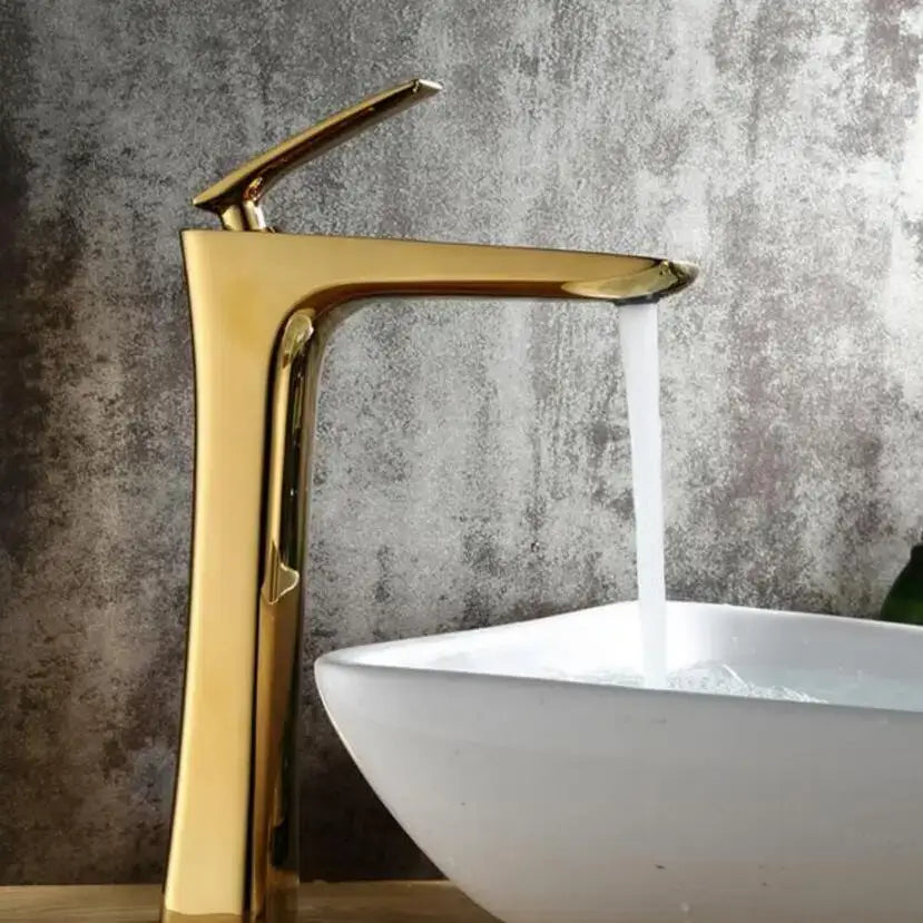 Modern matte black and gold decorbites basin faucet with sleek tall gold-toned polished metallic finish for bathroom use