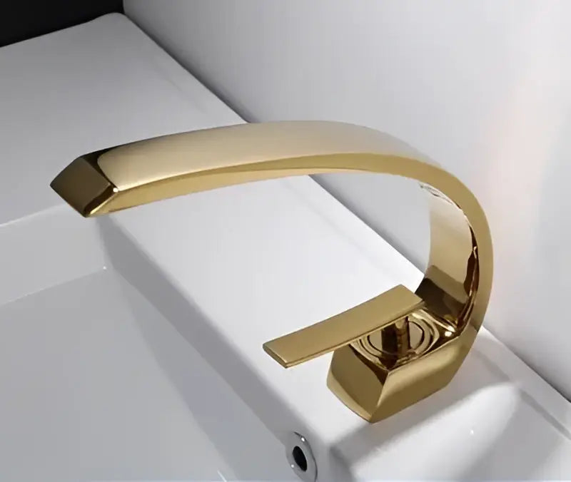 Gold modern basin faucet with sleek curved spout and rectangular handle for bathroom modern basin faucet use