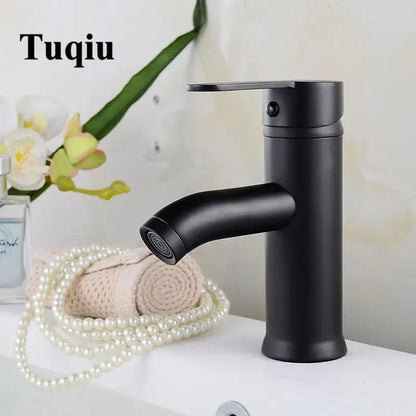 Modern matte black and gold single handle wash basin faucet with curved spout decorbites black single handle design