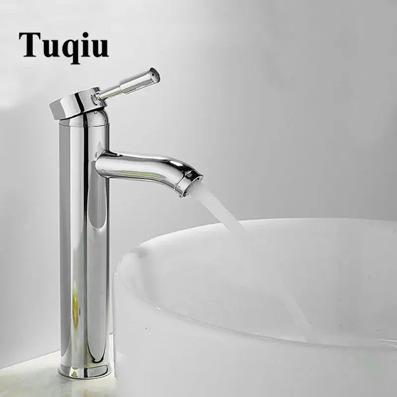 Modern matte black and gold single handle wash basin faucet with chrome finish and sleek flowing spout decorbites black single