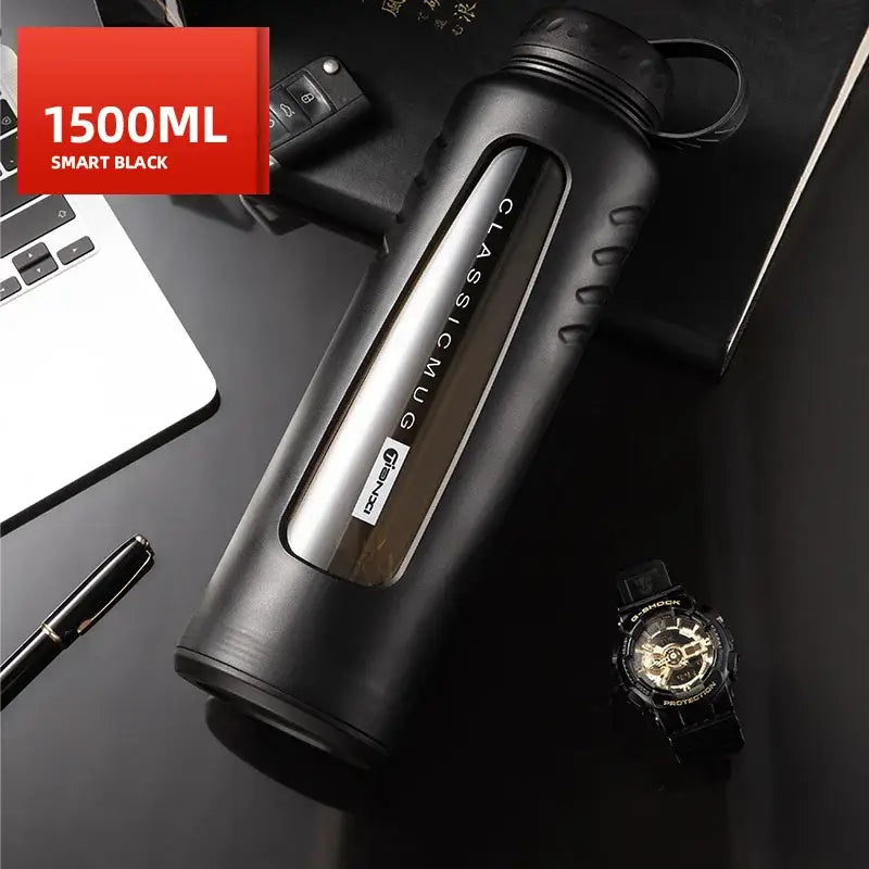 Black 1500ml insulated glass water bottle with sleek matte finish and textured grip for modern kitchen use